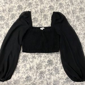 small black crop top with sheer sleeves